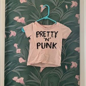 A pink and black Dip kids shirt